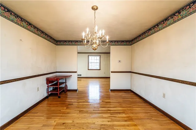 a kitchen with refrigerator cabinets and a sink