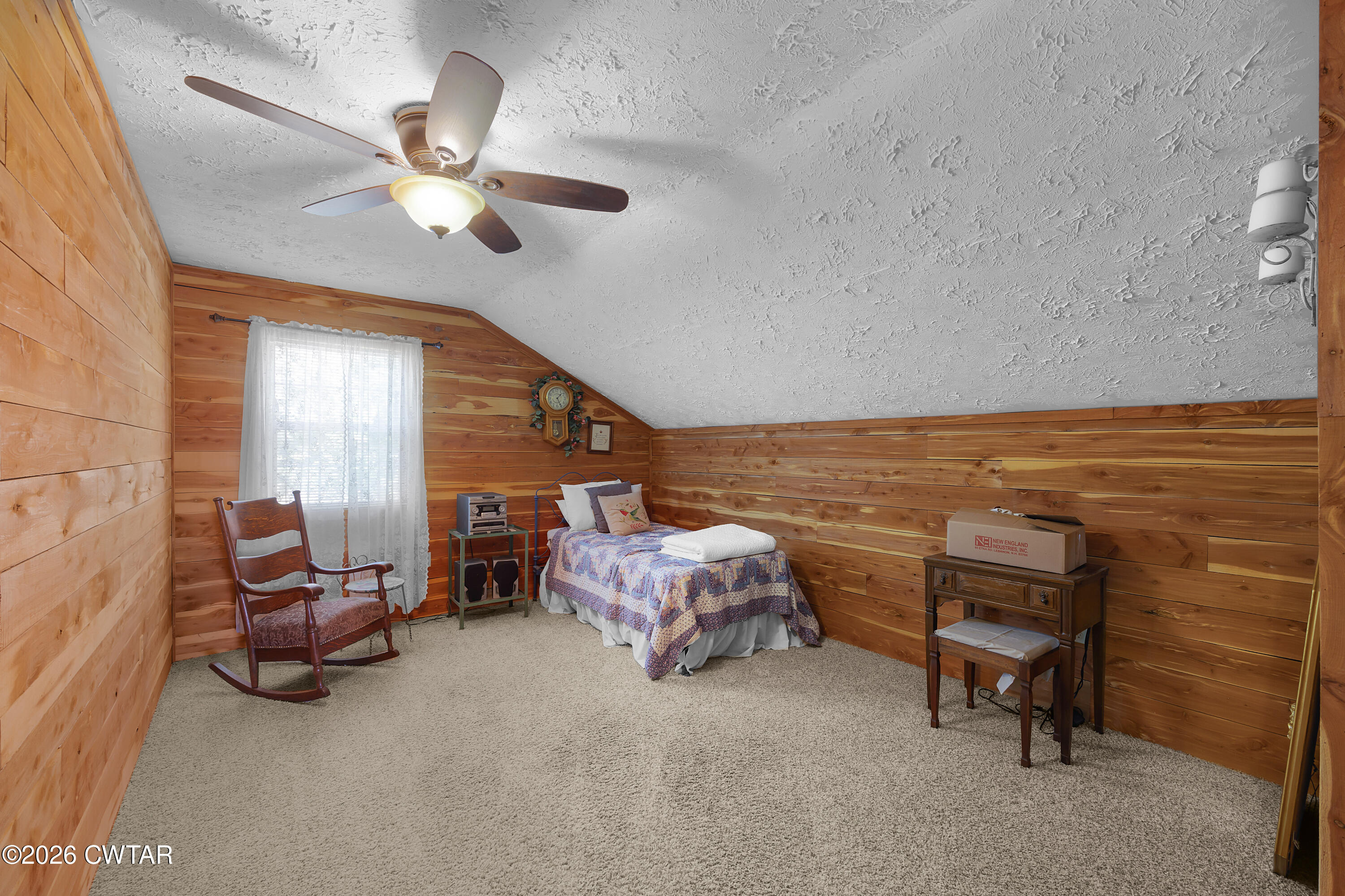 935 Parkers Camp Road Saltillo, TN 38370 - Photo 13 of 29 a bedroom with furniture and a chandelier