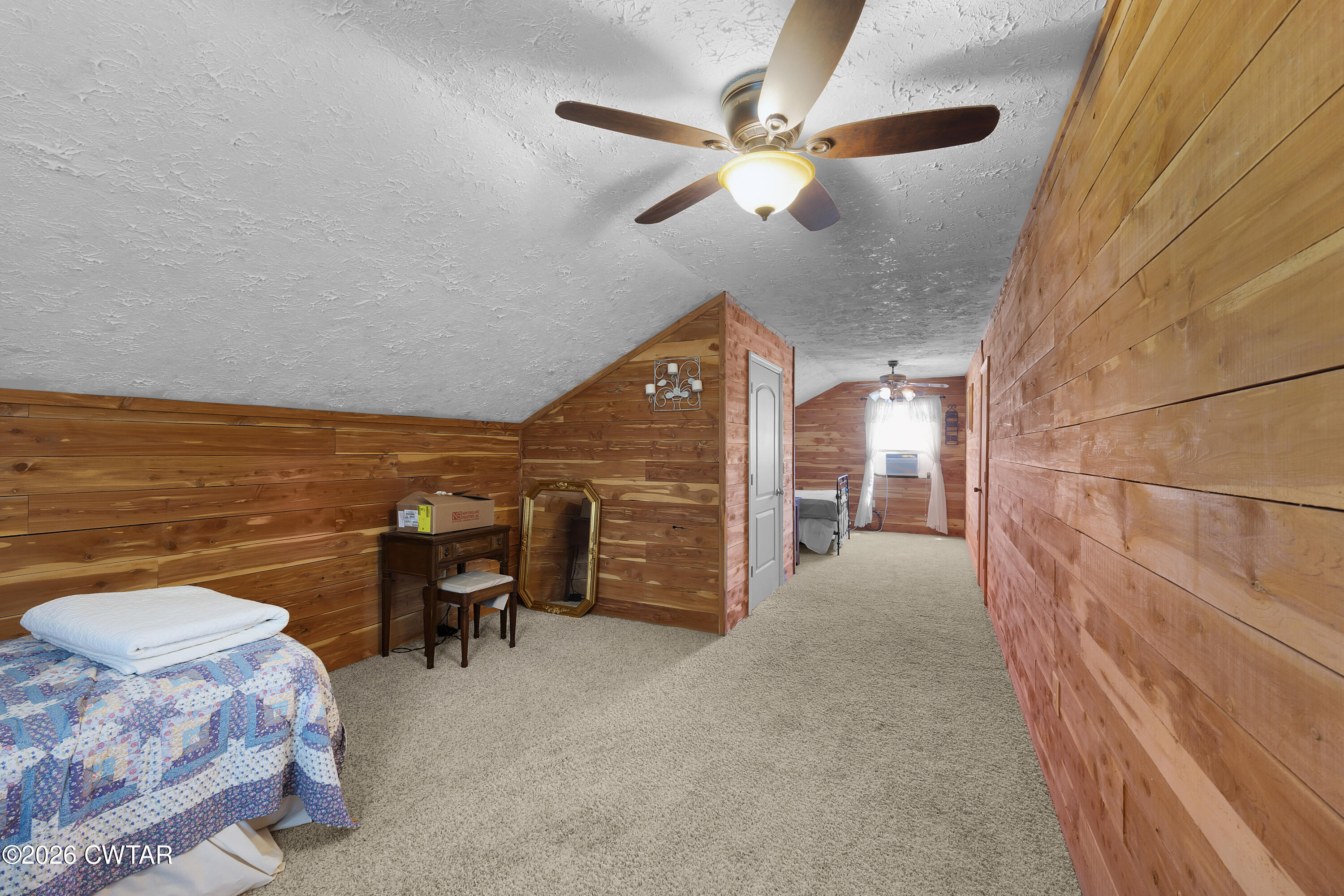 935 Parkers Camp Road Saltillo, TN 38370 - Photo 14 of 29 a dining room with furniture and a chandelier fan