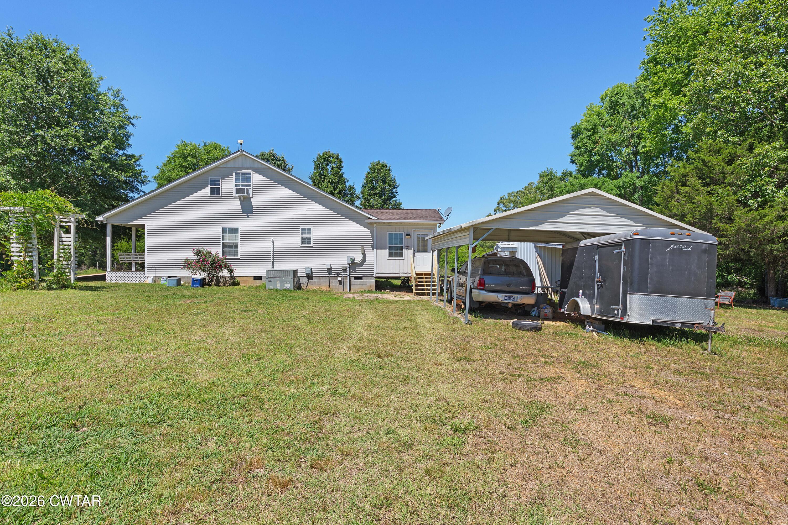 935 Parkers Camp Road Saltillo, TN 38370 - Photo 20 of 29 a house view with a garden space