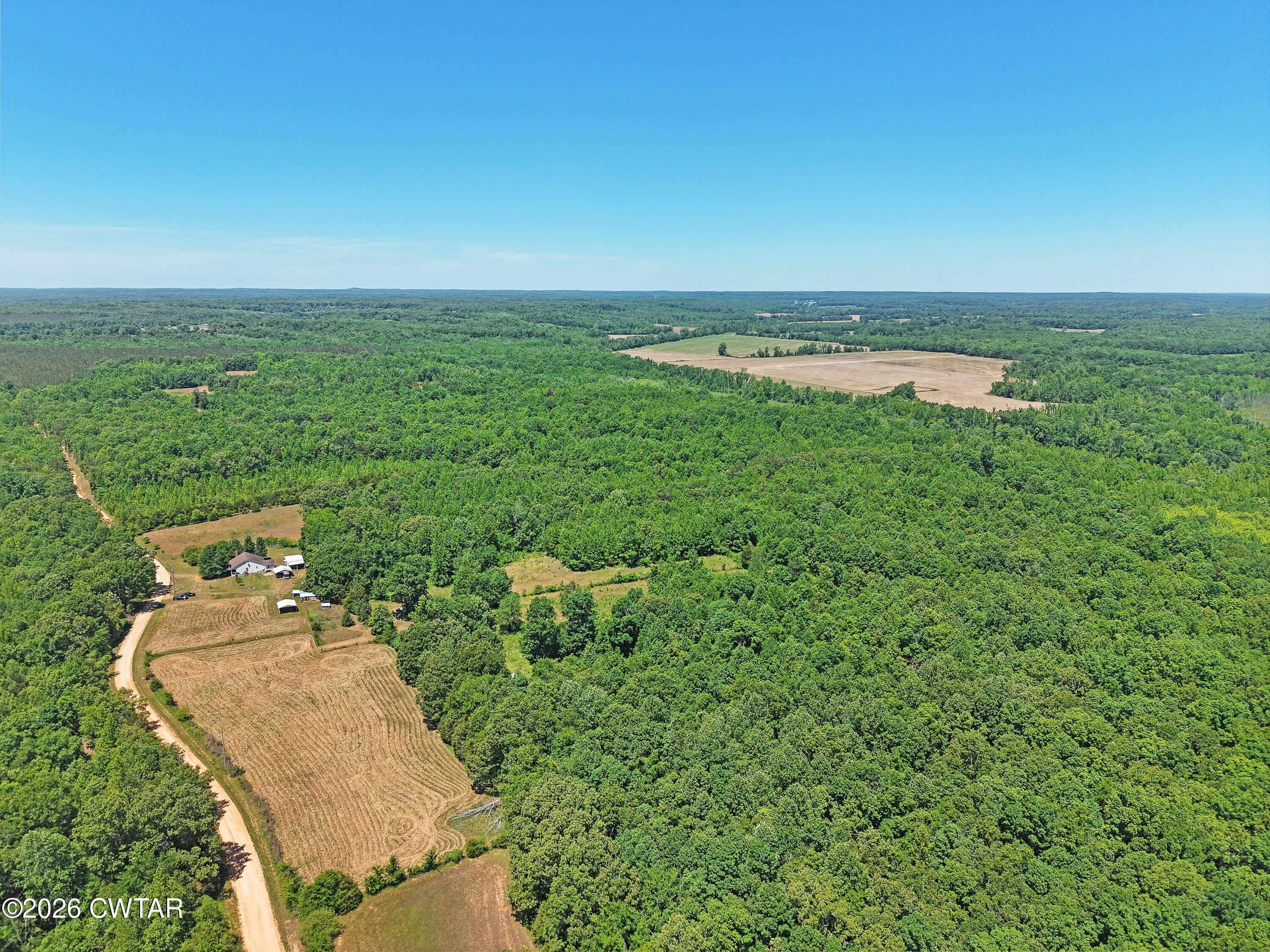 935 Parkers Camp Road Saltillo, TN 38370 - Photo 26 of 29 an aerial view of a houses with outdoor space and street view