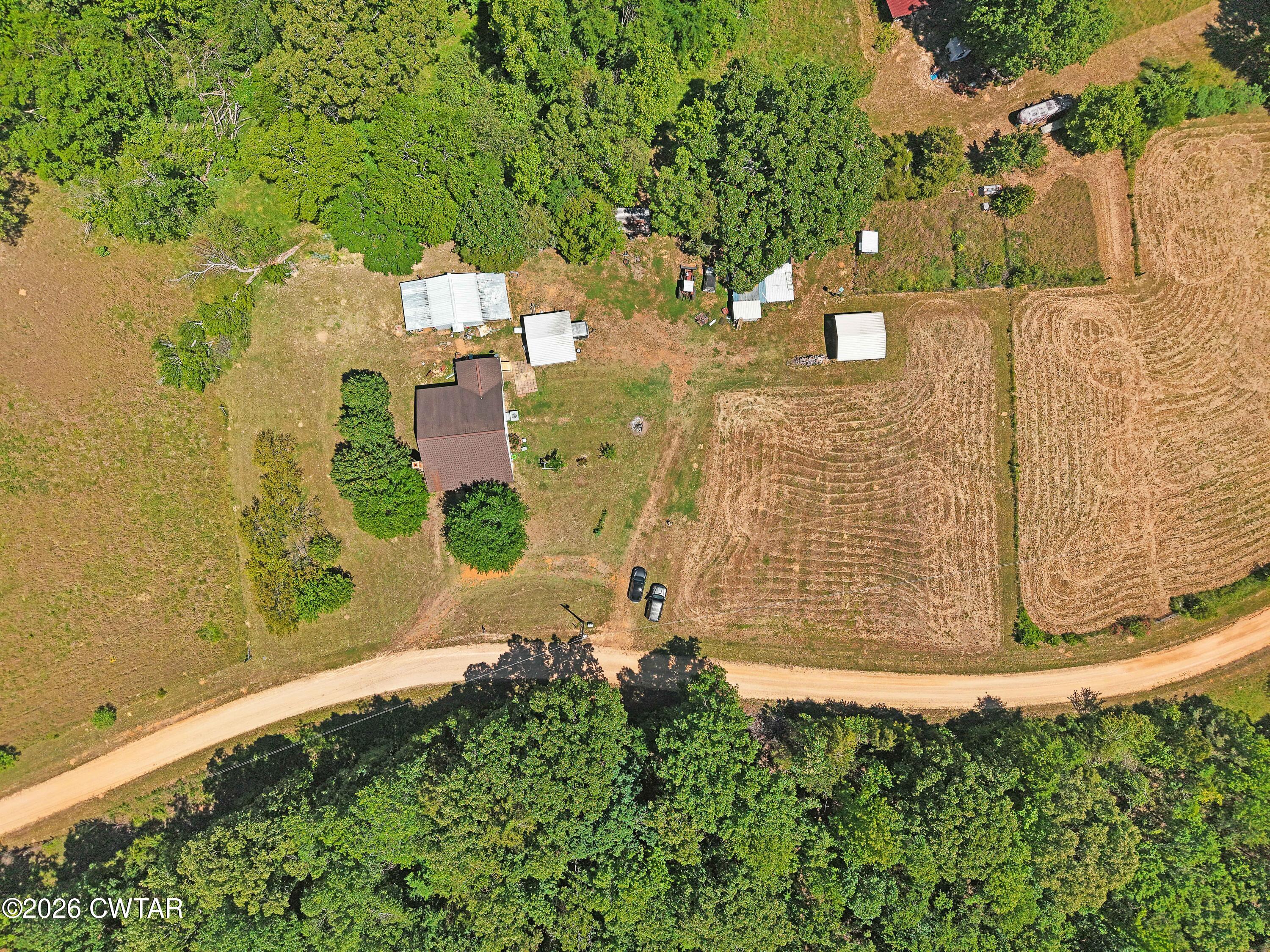 935 Parkers Camp Road Saltillo, TN 38370 - Photo 29 of 29 an aerial view of residential house with outdoor space