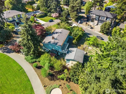 an aerial view of a house with outdoor space pool patio and outdoor seating