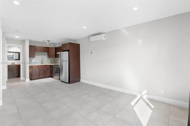 a view of kitchen and a window