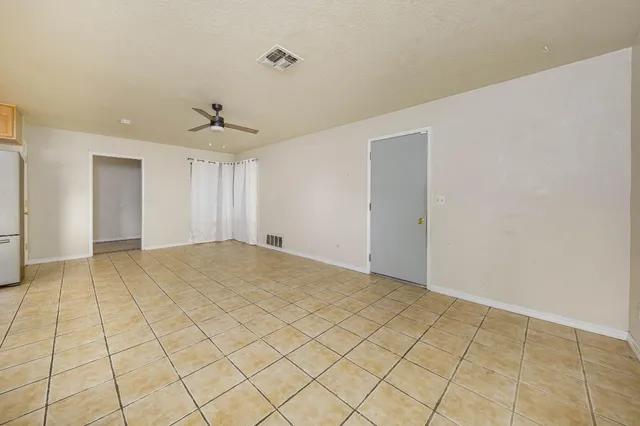 a kitchen that has a sink and a stove in it