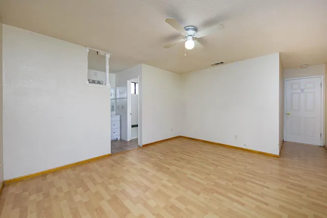 a bathroom with a toilet and shower