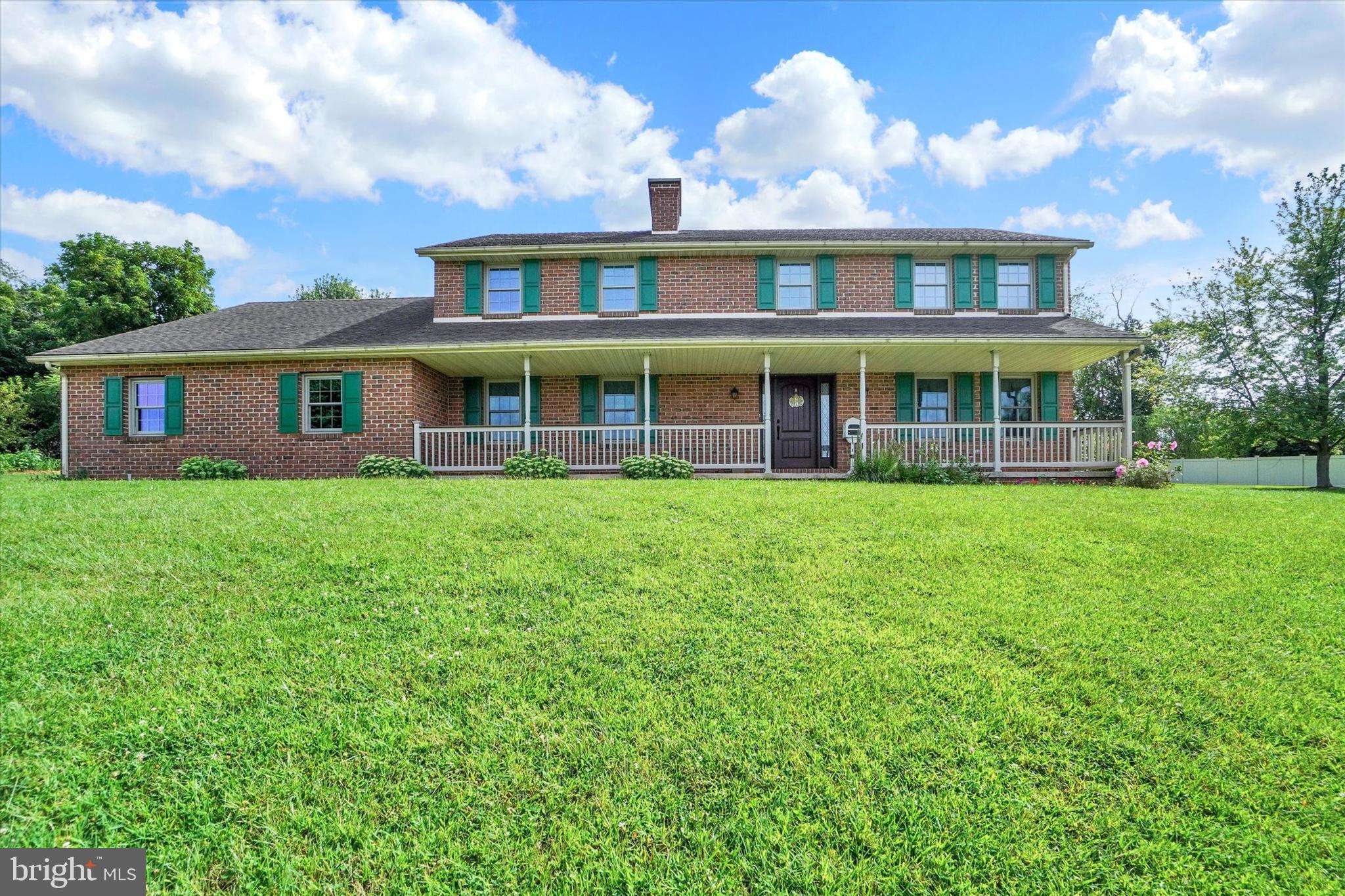 a view of a house with a garden