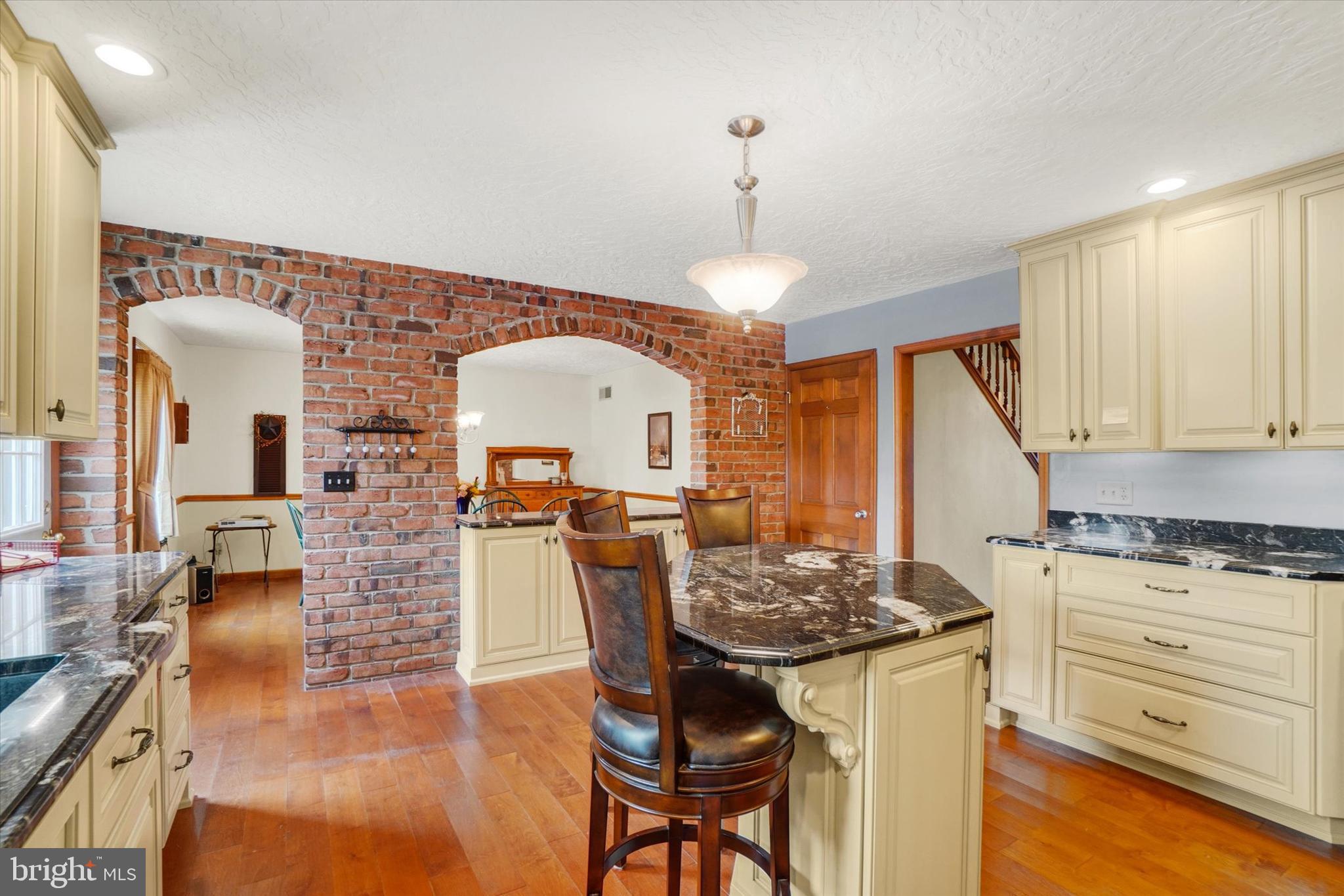 441 School Road York, PA 17407 - Photo 11 of 34 a kitchen with a table and chairs in it