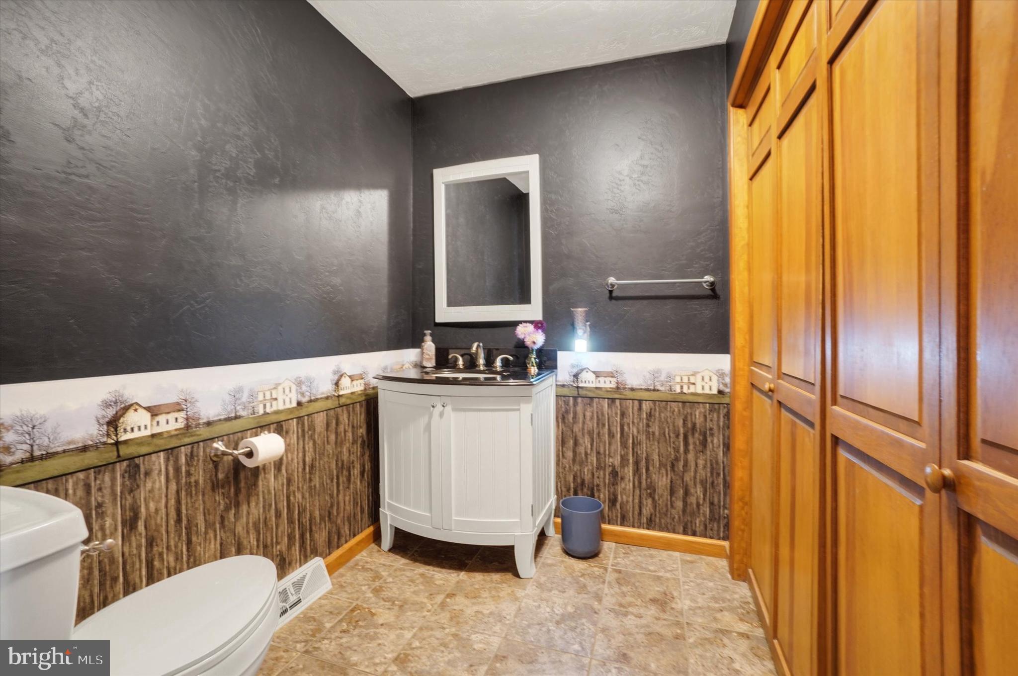 441 School Road York, PA 17407 - Photo 19 of 34 a bathroom with a granite countertop sink and a mirror