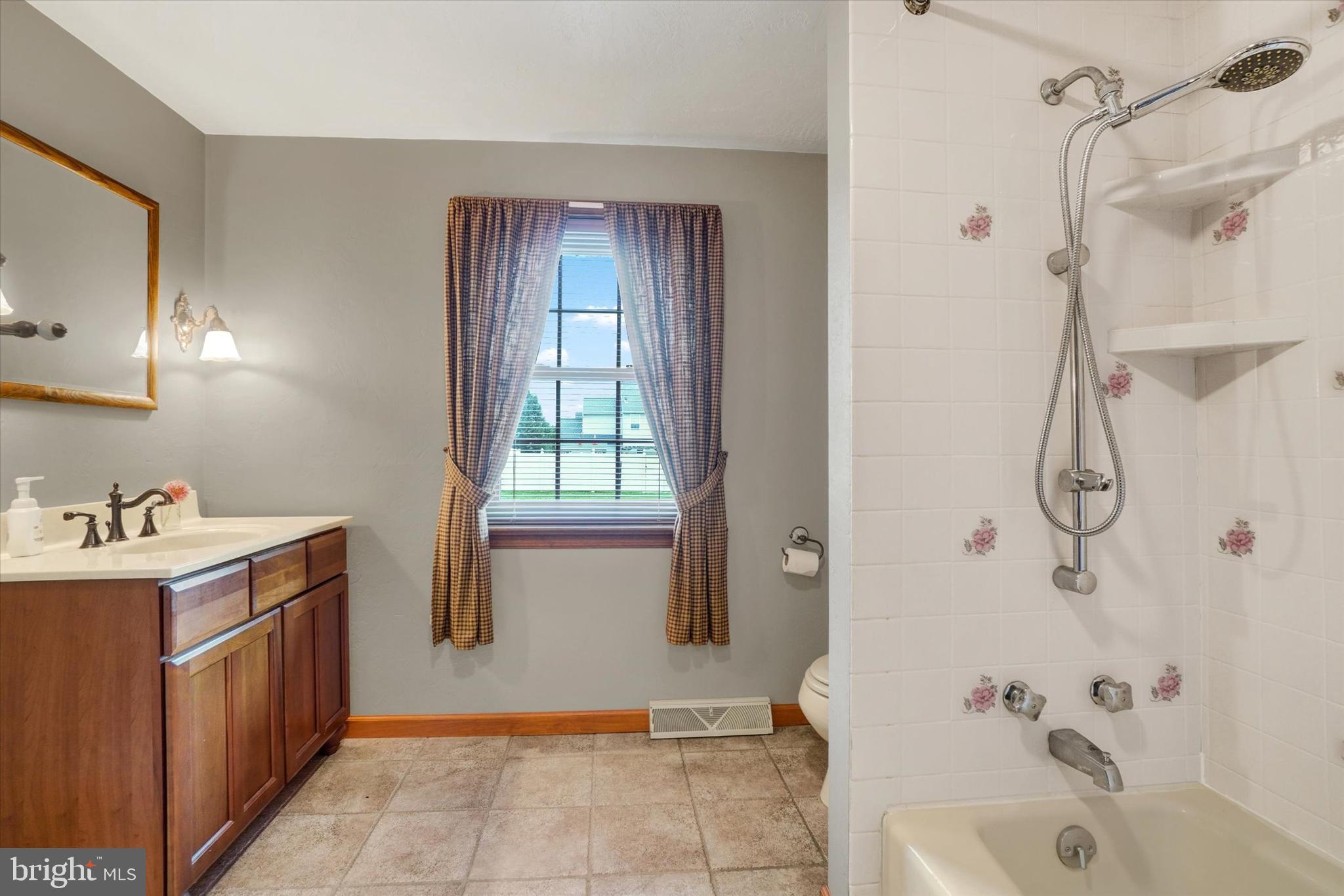 441 School Road York, PA 17407 - Photo 23 of 34 a bathroom with a sink a toilet and shower