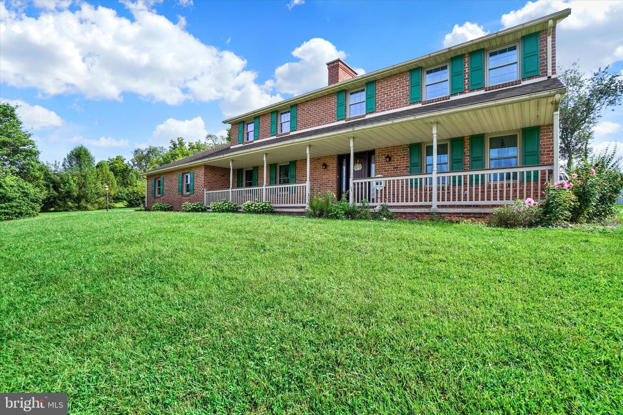441 School Road York, PA 17407 - Photo 4 of 34 front view of a house with a yard