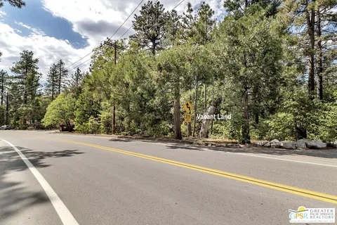 a view of a road with a building