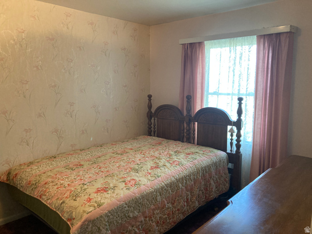 200 South 2800th Street West Ogden, UT 84404 - Photo 11 of 42 Bedroom with wallpapered walls
