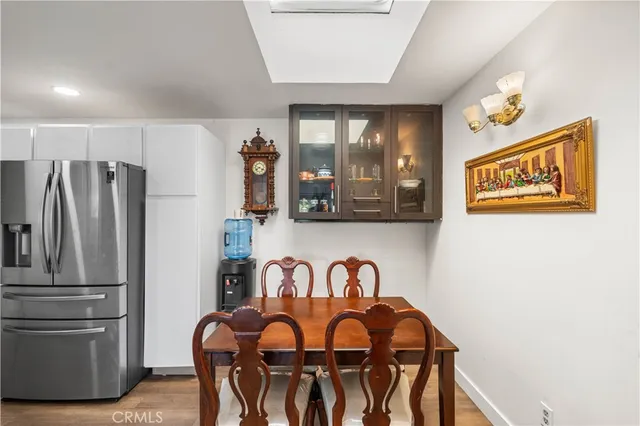 a view of kitchen with furniture and large window