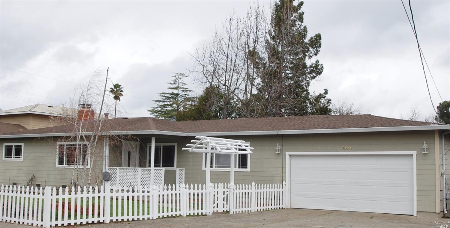 1658 Center Road Novato, CA 94947 - Photo 1 of 1 a front view of a house with a yard