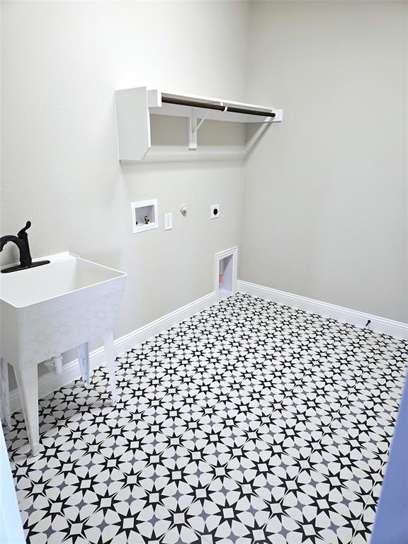 1429 Enloe Road Howe, TX 75459 - Photo 11 of 19 a bathroom with a black white checkered floor
