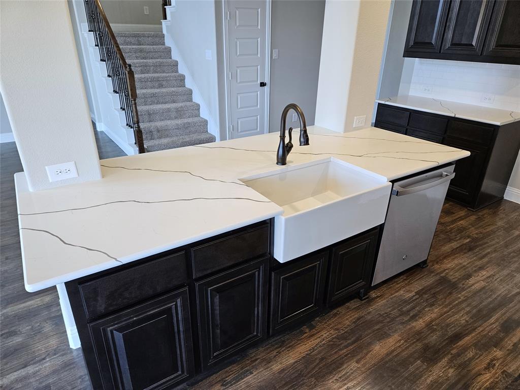 1429 Enloe Road Howe, TX 75459 - Photo 5 of 19 a kitchen with a sink and cabinets