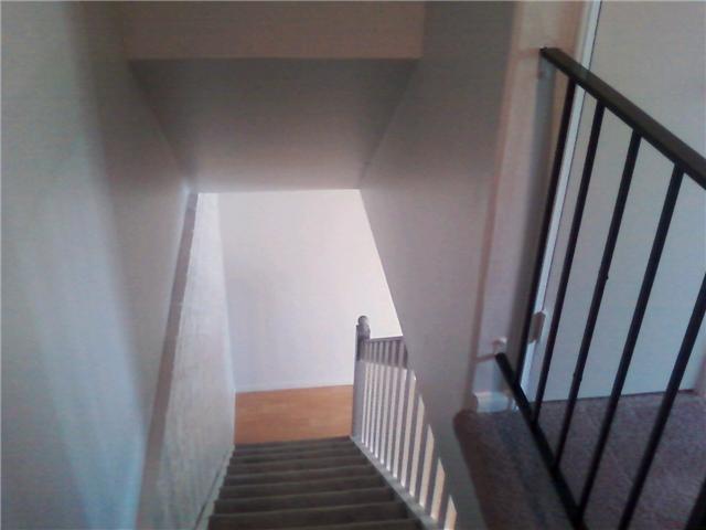 9906 Mission Vega Road, Unit 3 Santee, CA 92071 - Photo 3 of 8 Carpeted Stairs lead up to bedrooms