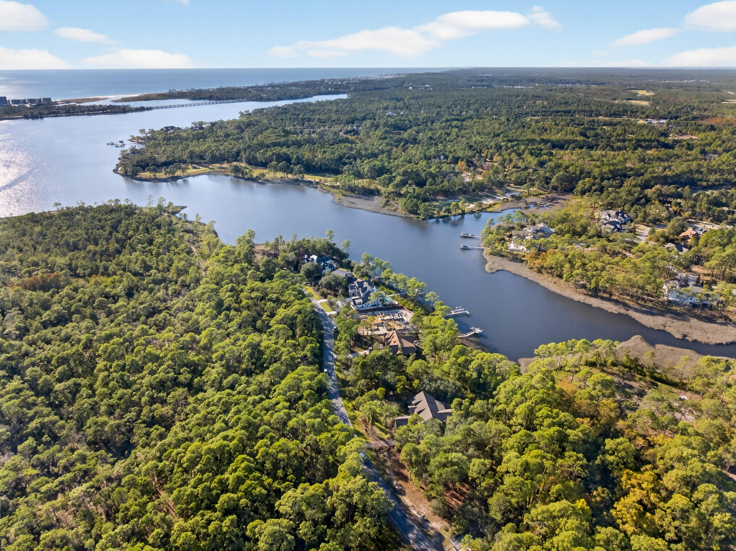 22113 Marsh Rabbit Run Panama City Beach, FL 32413 - Photo 4 of 23 a view of a lake with a city