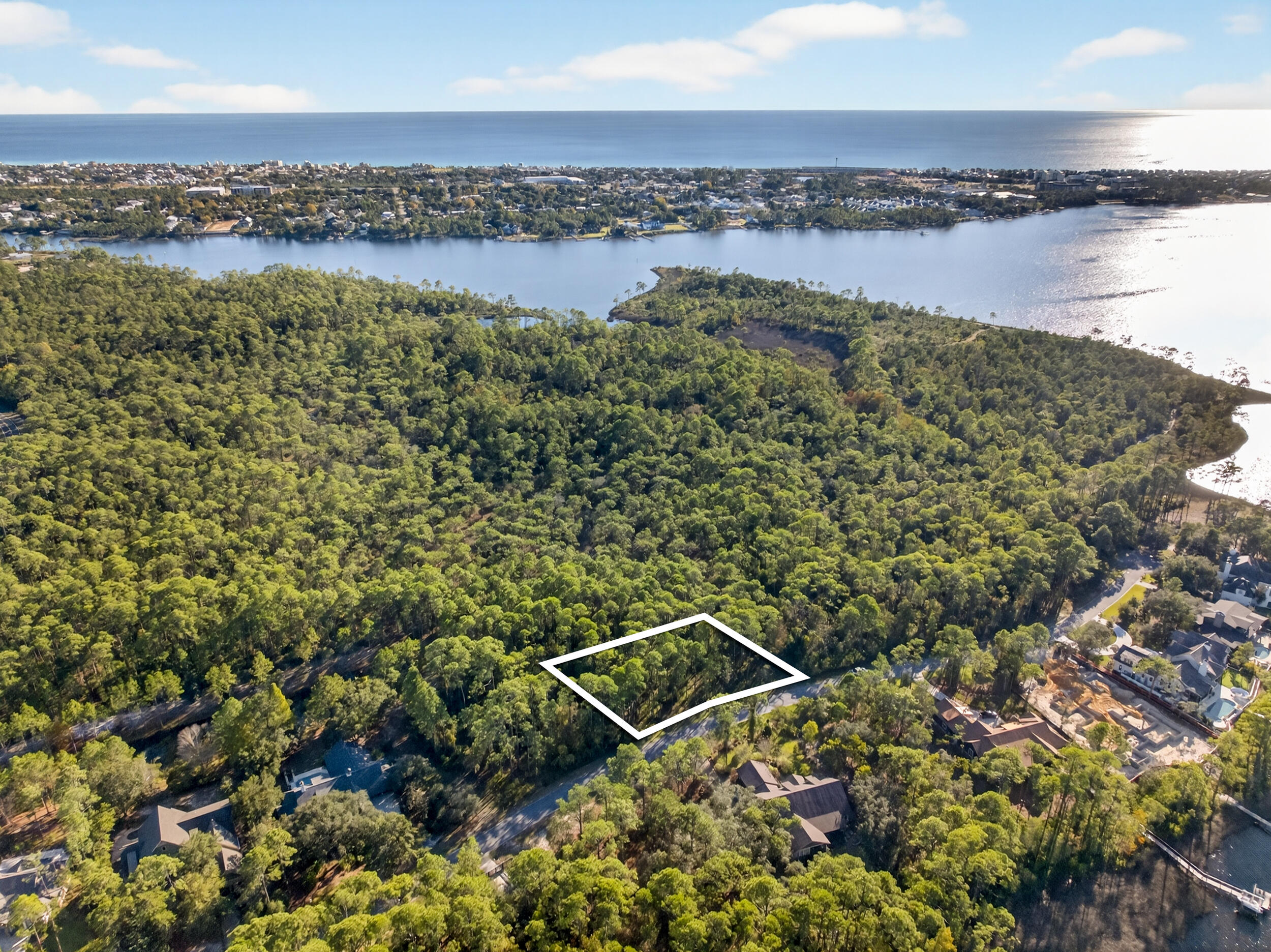 22113 Marsh Rabbit Run Panama City Beach, FL 32413 - Photo 7 of 23 a view of a lake with a city