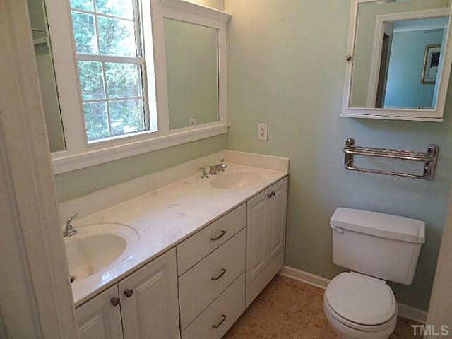 532 High Ridge Drive Durham, NC 27707 - Photo 16 of 20 The MASTER BATHROOM has newer tiling, vanity, and sinks. Master Bath/Spa