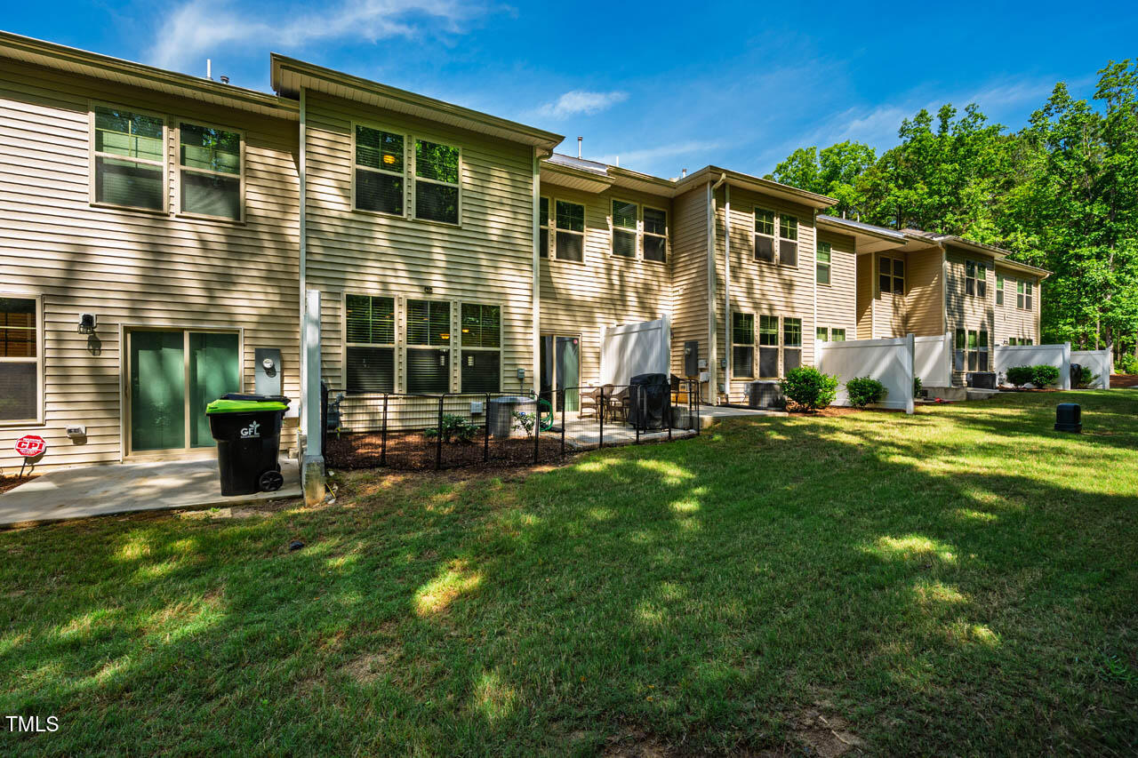 1101 Compass Drive Durham, NC 27713 - Photo 28 of 32 front view of a house with a yard
