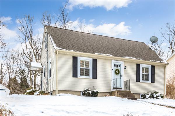 35 Woodland Road Wayland, MA 01778 - Photo 1 of 30 a front view of a house