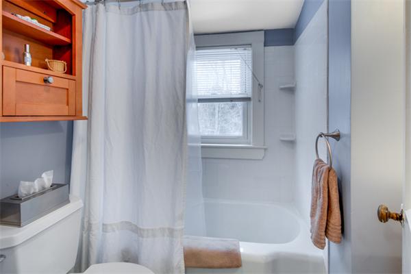 35 Woodland Road Wayland, MA 01778 - Photo 23 of 30 a bathroom with a sink and a toilet