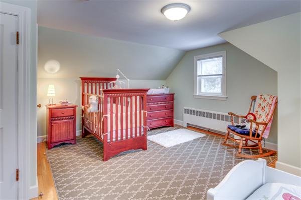35 Woodland Road Wayland, MA 01778 - Photo 25 of 30 a living room with furniture a rug and a window