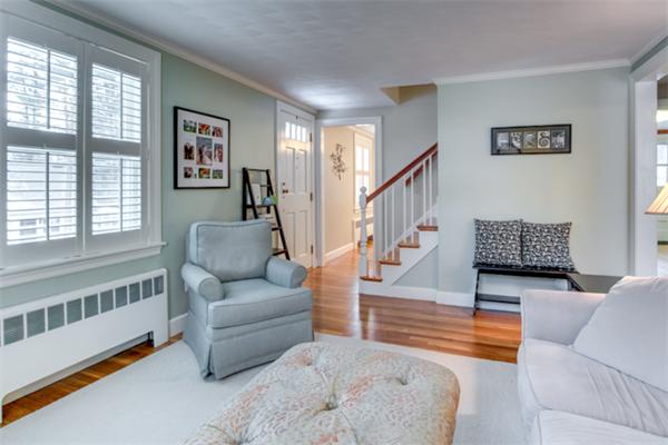 35 Woodland Road Wayland, MA 01778 - Photo 4 of 30 a living room with furniture and stairs