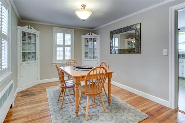 35 Woodland Road Wayland, MA 01778 - Photo 8 of 30 a view of a dining room with furniture and wooden floor