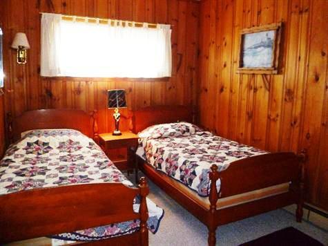 28 Manderville Road West Harwich, MA 02671 - Photo 12 of 18 a bedroom with bed and window