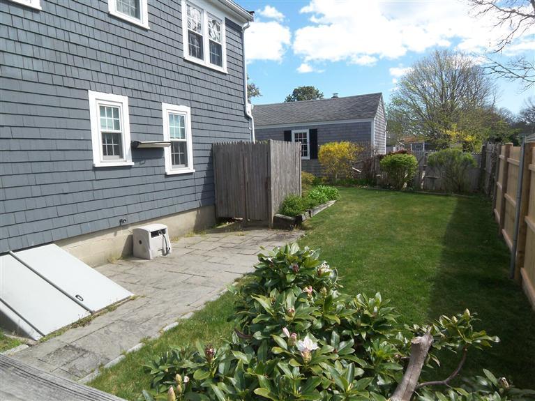 28 Manderville Road West Harwich, MA 02671 - Photo 14 of 18 a front view of a house with garden