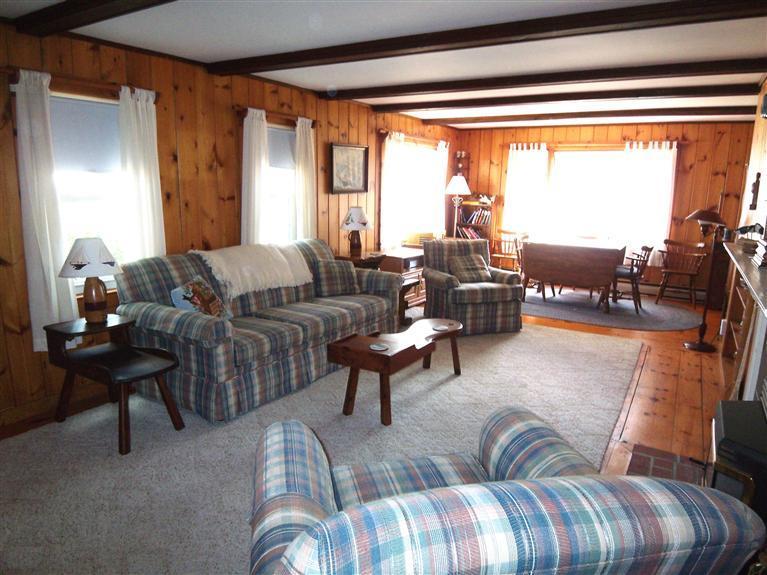28 Manderville Road West Harwich, MA 02671 - Photo 5 of 18 a living room with furniture and a large window