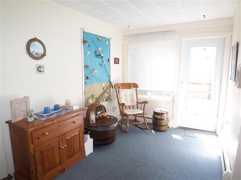 28 Manderville Road West Harwich, MA 02671 - Photo 8 of 18 a bedroom with furniture and a window