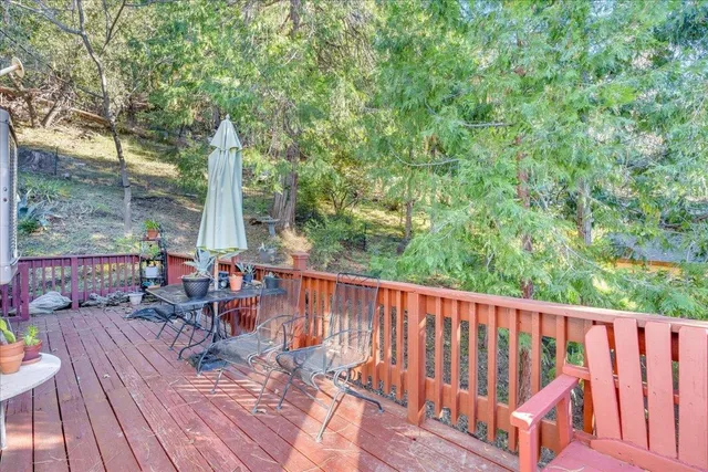 a view of balcony with couch and chairs