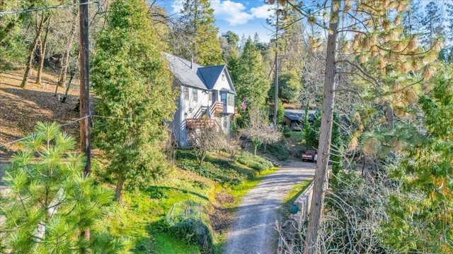 a backyard of a house with lots of green space