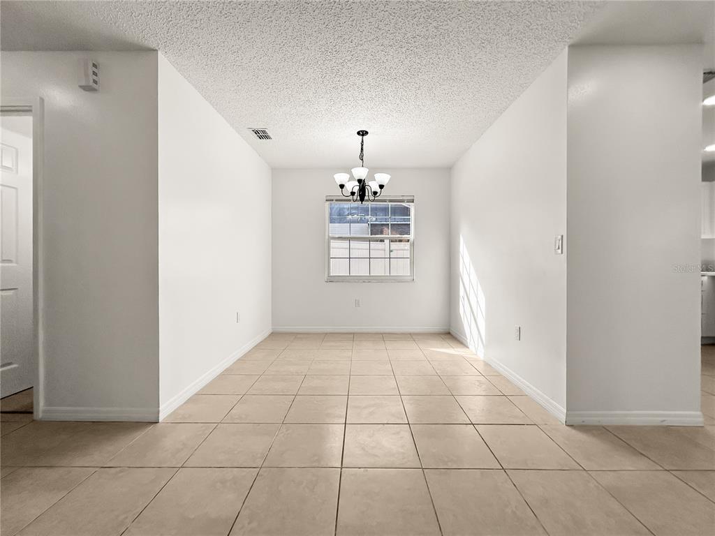 1610 Harbor Way Bartow, FL 33830 - Photo 14 of 25 a view of an empty room with a window