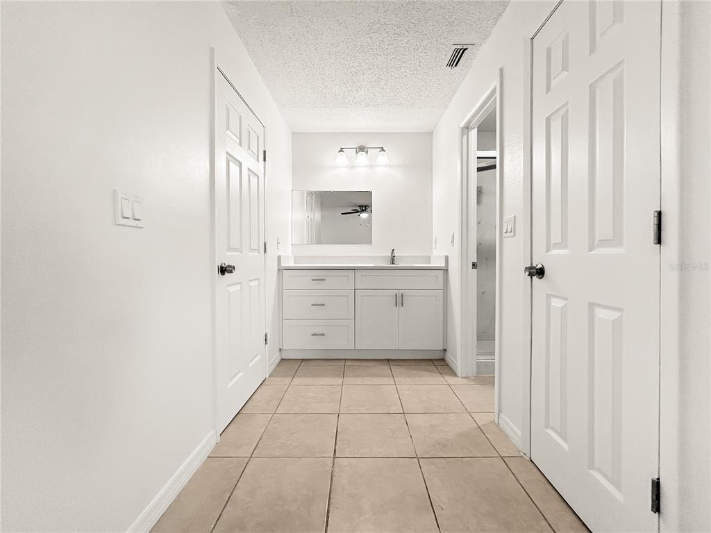 1610 Harbor Way Bartow, FL 33830 - Photo 20 of 25 a bathroom with a sink a toilet and shower