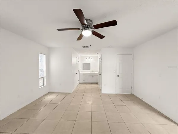 a view of an empty room and window