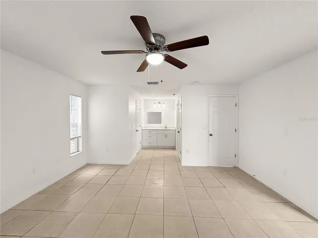 a view of an empty room and window