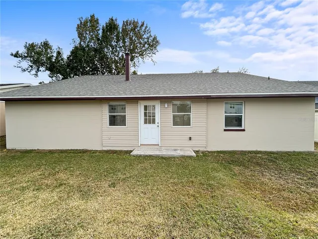a view of a house with a garden