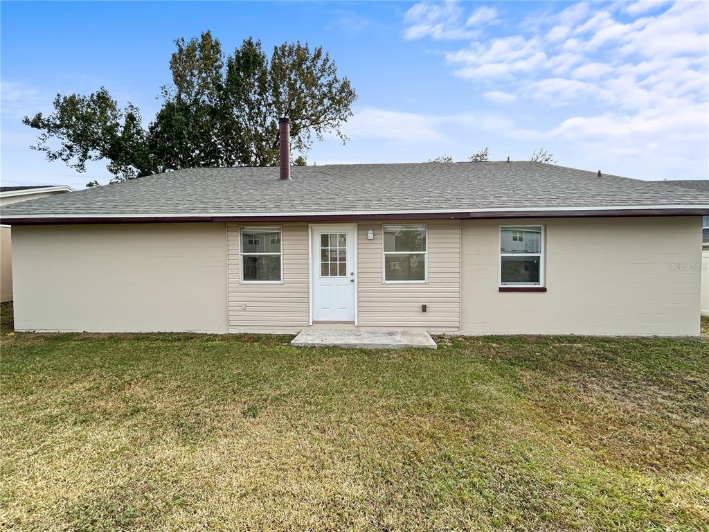 1610 Harbor Way Bartow, FL 33830 - Photo 5 of 25 a view of a house with a garden