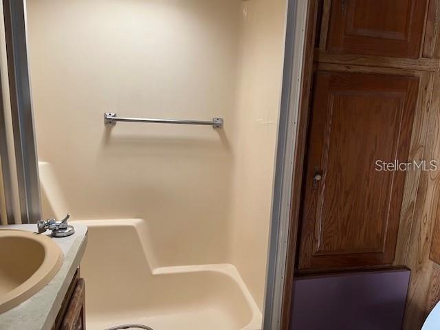 3000 Clarcona Road, Unit 445 Apopka, FL 32703 - Photo 10 of 13 a bathroom with a tub