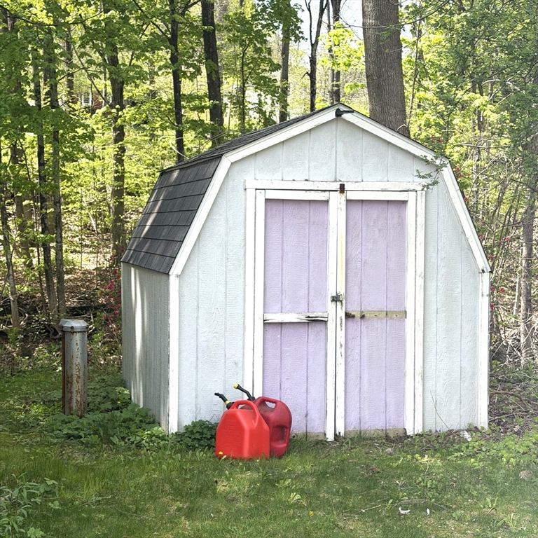 87 Ashfield Road Conway, MA 01341 - Photo 5 of 38 a front view of a house with garden