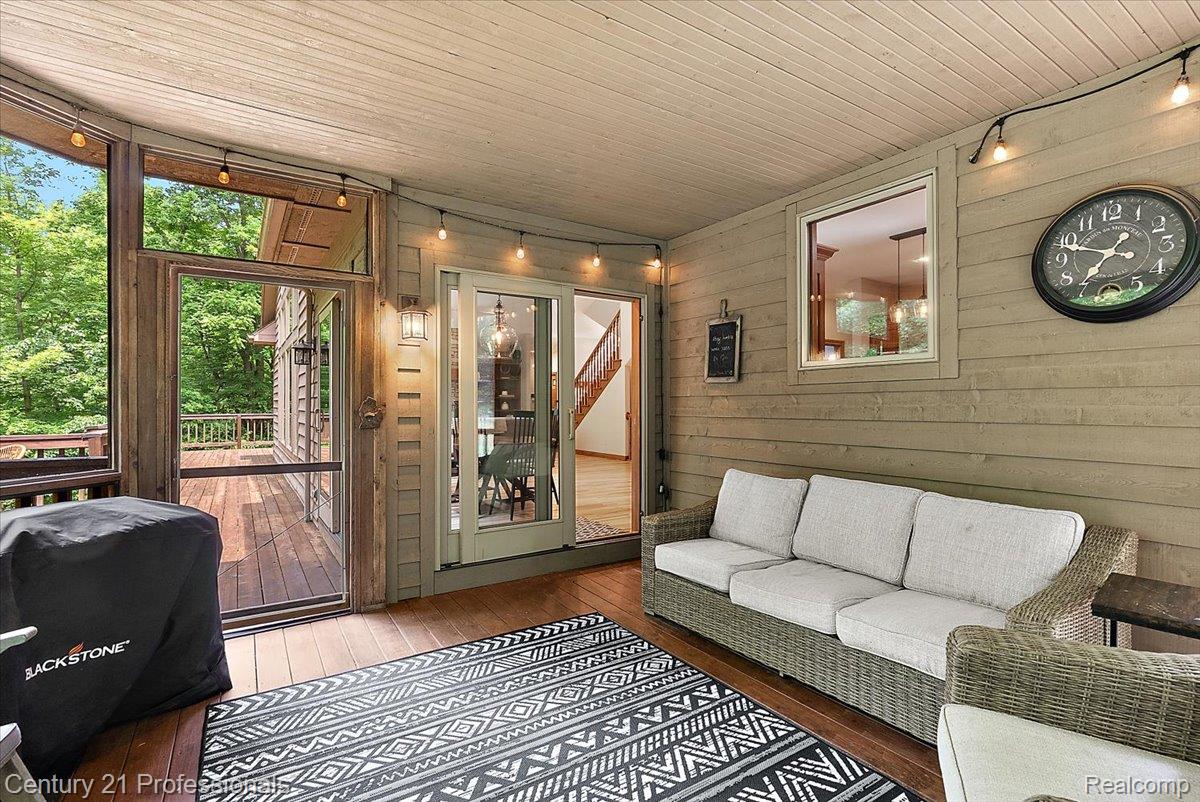 9867 Rainbow Ridge Drive Schoolcraft, MI 49087 - Photo 59 of 82 Screened porch with wood-finish flooring, wood-paneled ceiling, and horizontal siding walls