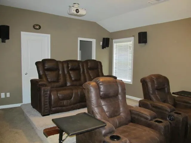 a living room with furniture and a couch