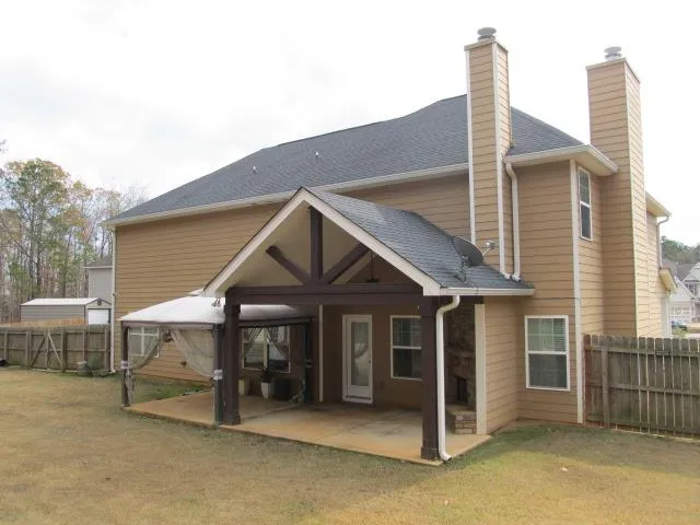 a front view of a house with a garage