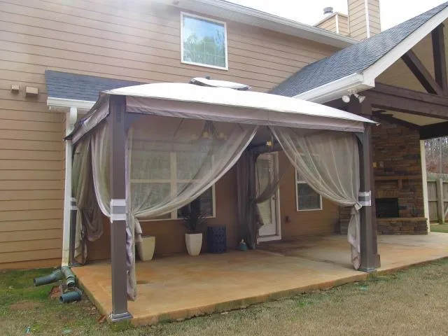 a small pool with a bench and trees