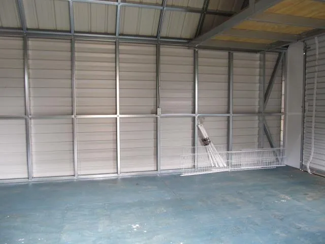 a view of a room with wooden walls